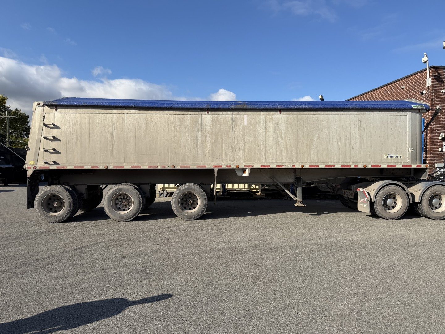 Stargate dump trailer 3-axle 68" wall used 2013 – Photo 1