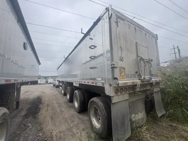 Cobra dump trailer 4-axle 72" wall used 2023